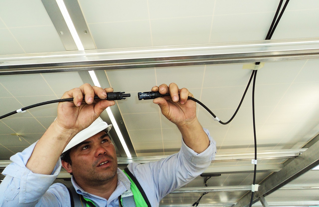 man installing an air conditioning unit